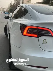  14 تسلا موديل 3 لون أبيض لؤلؤي 2022 Tesla model 3 . 2022