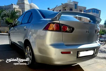  28 ميتسوبيشي لانسر 2014 بحال الوكالة