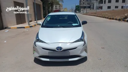  16 تويوتا بريوس لون ابيض لؤلؤي فحص 3 جيد بسعر مغري قابل للبدل