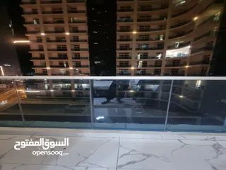  5 للايجار الشهري شقة غرفتين و صالة مفروشة في أبراج الواحة في عجمان بمنطقة الراشدية