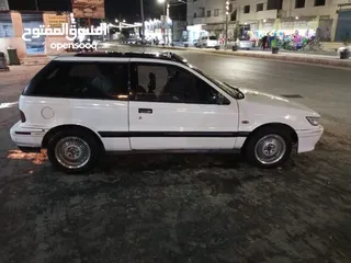  1 متسوبيشي ميراج 1990 ابيض باب واحد