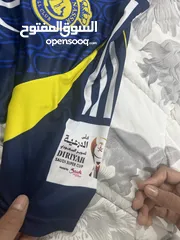 6 قميص نادي النصر السعودي القميص اصلي 100٪من اديداس وليس عليه شئ طباعة استعماله تحت المتوسط لاكنه جديد