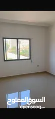  7 Excellent natural light and winds with views of Shafa Badran from the highest level in the building.