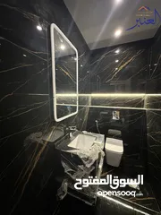  8 شقة أرضية مع تراس مساحة 165م2 بمنطقة ضاحية الرشيد قرب دوار اقرأ / تدفئة غاز مركزي راكب