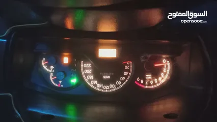  14 متسوبيشي لانسر لون شمباني موديل 2004