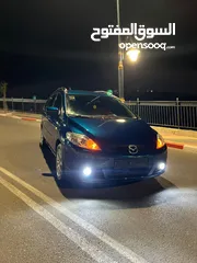  5 مازدا 5 جير عادي 6+1 متور 2000 بنزين رخصه و تامين جديد  عداد قليل فحص نخبب سعرر كااششش