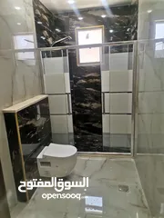  18 شقه 205 م طابق ثاني فني للبيع على شارع البترا شرق اربد مول قراند مقابل بيت البن البرازيلي