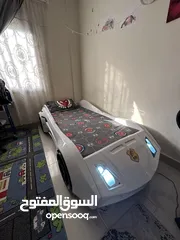  2 سرير اطفال بدون مقابل  ( سيارة مع اضاءة وصوت )