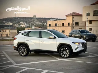  6 هونداي توسان 2023/ فل الفل فتحة سقف بانوراما  2x4 ///240Hp بنزين + كهرباء  ( Haybrid) 1600cc