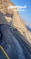  21 تزفيت ساحات وعزل اسطح