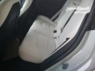  4 تيسلا 2021 ستاندرد بلس فحص كامل 4 جيد في المنطقة الحرة وارد امريكي داخلي ابيض