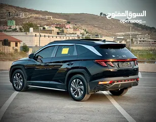  10 هونداي توسان/2022 فل الفل فتحة سقف بانوراما  2x4 ///240Hp بنزين + كهرباء  ( Haybrid) 1600cc