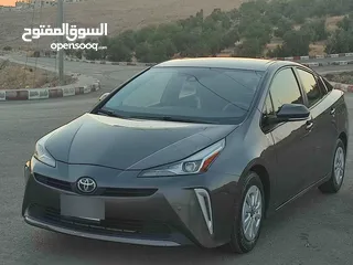  18 تويوتا بريوس 2020 حره باسم المستورد لون فيراني بطاريه ليثيوم بسعر مغري جدا