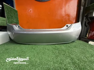  5 صدام خلفي تويوتا بريوس 2010-2015  اصلي مستعمل بحالة جيده موضوح بصور  Toyota Prius 2010-2015