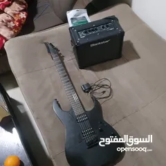  2 Ibanez electric guitar with amplifier