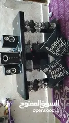  1 طاوله شاشه زجاج لون اسود شبه جديد