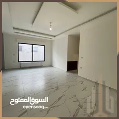  10 شقة طابق اول للبيع في تلاع العلي بالقرب اسواق السلطان مساحه200م .