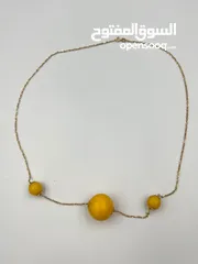  7 قلادة ذهب بكهرمان كلنغرادي نسائية -Women's 18k gold necklace with natural, untreated Clingard amber