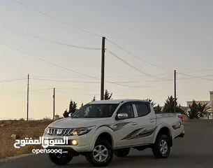  4 ميتسوبيشي L200 2016 لون ابيض مميزه فحص كامل كرت ابيض دفع رباعي 4x4