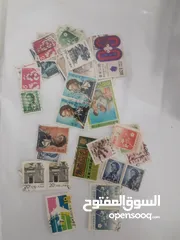  13 طوابع قديمة منذ اكثر من 50 عام