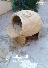  8 فرن طابون متحرك صنع من طين