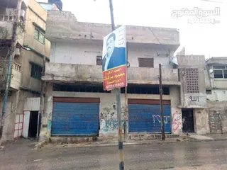 12 ارض تجاري مع طابقين مع مخزنين-الزرقاء-الجبل الابيض (كلو مفروز) قوشان مستقل-كاش فقط لا يتوفر تقسيط...