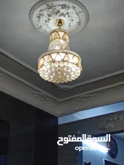  1 ثريات ثنتين لون ذهبي بحالة جيده للبيع