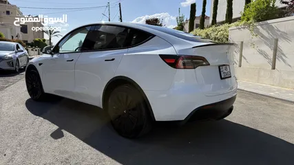 3 Tesla model Y dual motor
