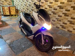  1 هوندا pcx.