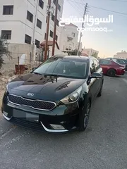  7 كيا نيرو كحلي ميتالك 2018