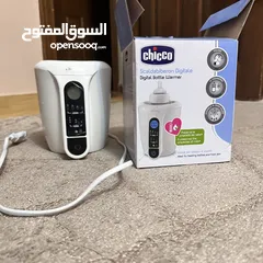  6 جهاز تسخين الرضاعة للبيبي ديجيتال Chicco bottle    السعر 20 دينار warmer