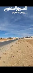  2 ارض للبيع ام الرصاص على الشارع الرئيسي