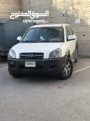  2 توسان 2005 بوضع  جيد  فتحه سقف هوك مرخص  تامين ترخيص