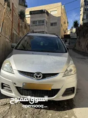  1 مازدا 5  سبع ركاب