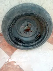  2 جنط مع كوشوك سبير بحال ممتاز قياس 14 ياباني اصلي شركه