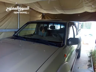  12 بكم نيسان 4x4 موديل 2005 قابل للتفاوض او البدل بسيارة تويوتا