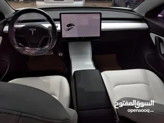  9 تيسلا 2021 ستاندرد بلس فحص كامل 4 جيد في المنطقة الحرة وارد امريكي داخلي ابيض