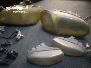  13 كشافات سوناتا2013 واضويه ميتسوبيشي 98 وكيا2 كشافات وقطع للبيع