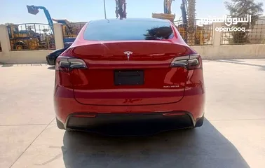  12 Tesla model y 2021 long range dual motor 2021 forsale السعر مغري جدا جدا مجمرك جاهز موجود خارج الحر