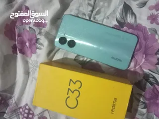  2 ريلمي c33 معاه الشاحن والكرتونه