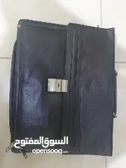  1 شنطة رجالية للعمل