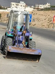  7 تعهدات عامة وهدم مباني ونقل جميع أنواع مواد البناء ونقل تراب أحمر وتعبيد الشوارع بأفضل أنواع الخلطة