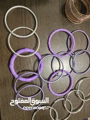  24 اساور بلاستيك بنفسجي، وفضي عدد 15