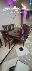  6 طاولة سفرا 8كراسي نوع زان بحالة الوكاله لا تحتاج لأي نوع من الصيانه