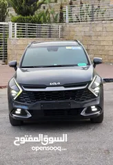  15 كيا سبورتاج هايبرد 2023 / فل كامل مع بانوراما وفرش مميز غرفه عسليه / عداد قليل / سعررر مميز جداً