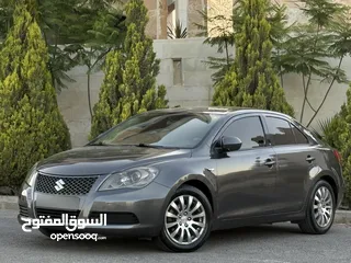  1 سوزوكي كيزاشي موديل 2013 بحالة الوكالةً فحص كامل