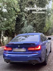  1 فرش بني مميزBMW 320i 2022