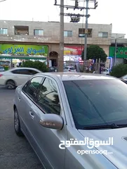  8 مرسيدس للبدل على احدث e200 كرت ابيض 2004