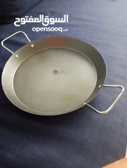  1 paella pan. expat leaving