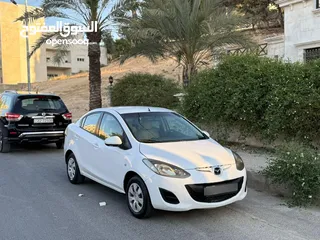  8 مازدا زوم 2 موديل 2012 فحص كامل 7 جيد ولا ملاحظة لون ابيض قاطعة مسافة 100 الف كيلو فقط (استخدام شخصي